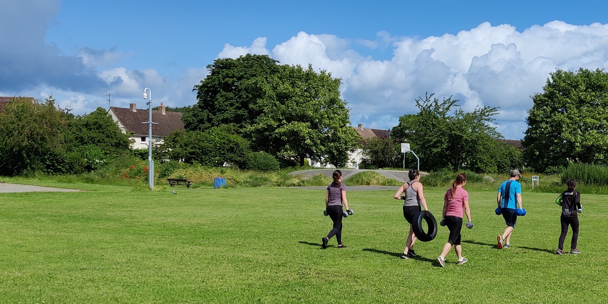 Two people jogging in a park